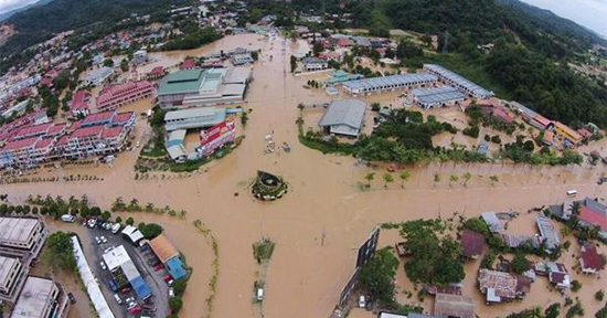 An unatributed picture widely circulated on social media depicting the flooded town of Donggongon, Penampang on the outskirts of Kota Kinabalu