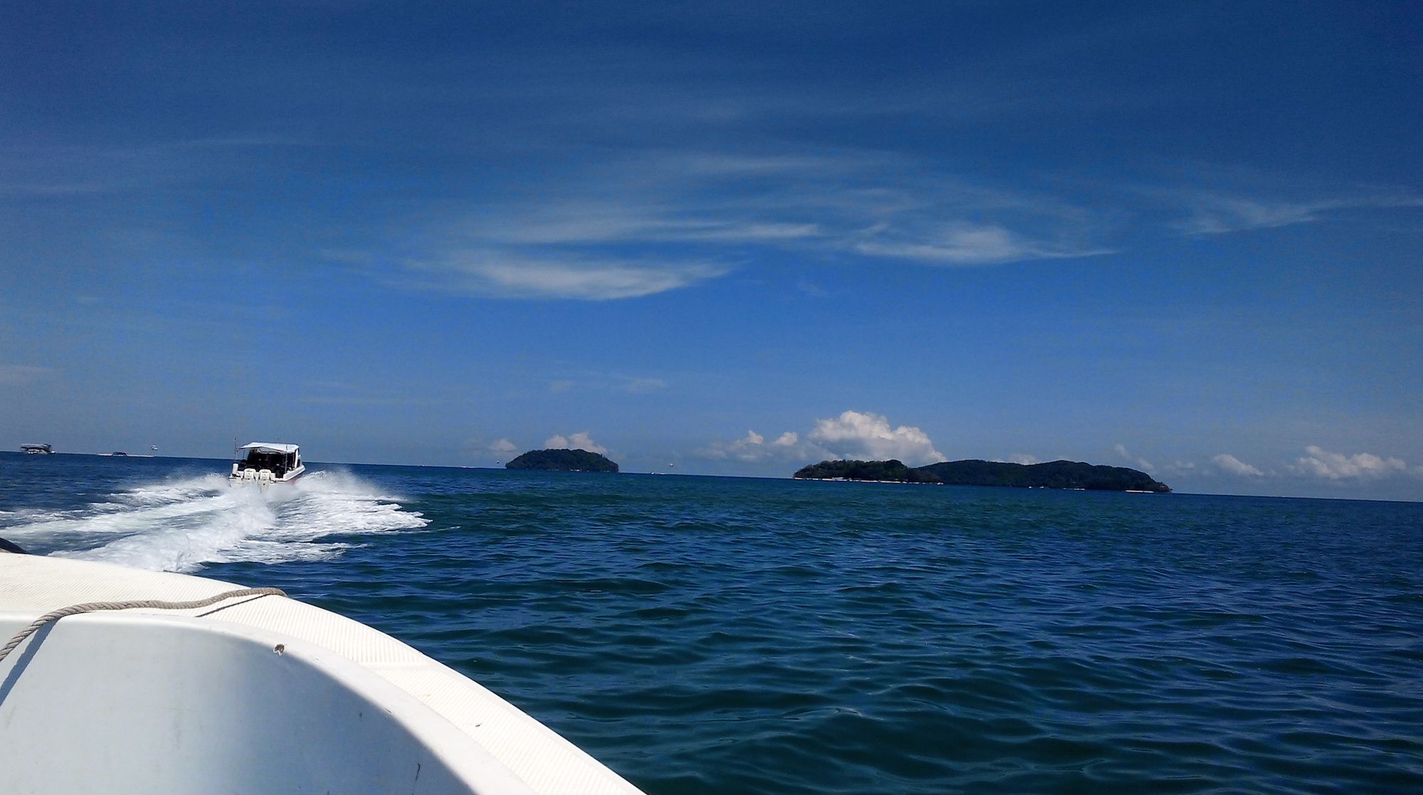 Sabah by boat. Come on in, the water is lovely.
